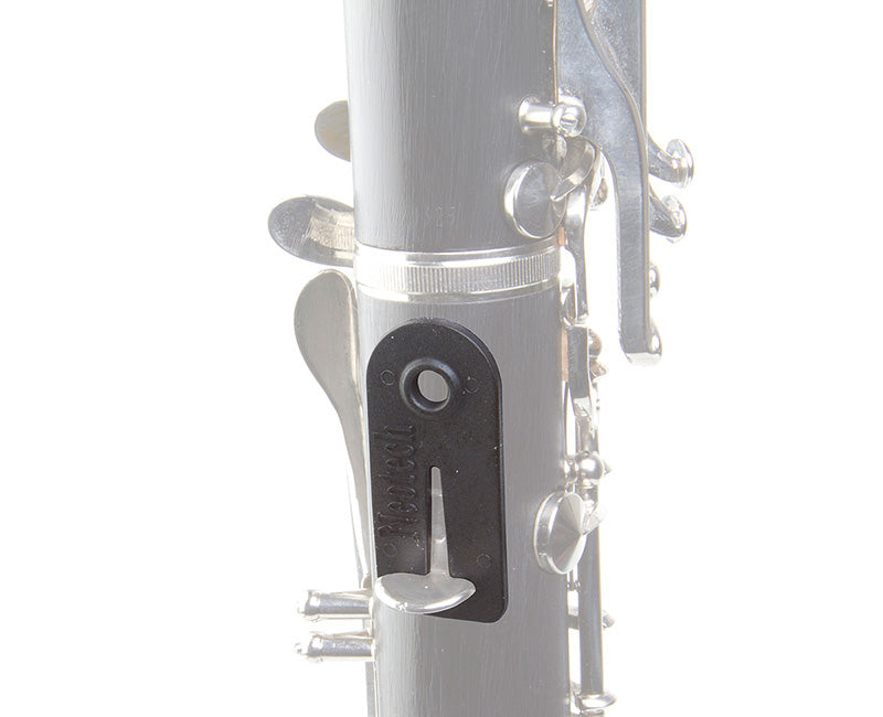 C.E.O. Thumb Rest Tab attached to instrument